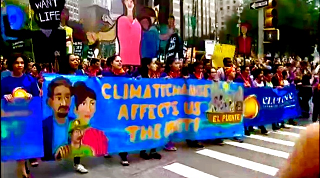 MINORITIES JOIN CLIMATE MARCH IN NY